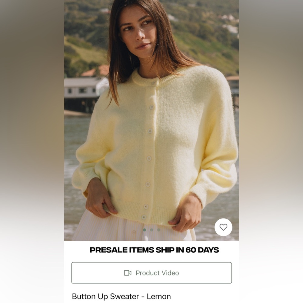 NWT DAILY DRILLS YELLOW BUTTON
UP SWEATER